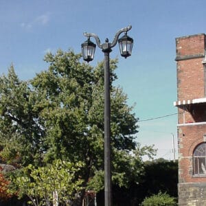 K56 Cleveland fixtures accompanied by Santiago style arms all on top of a Classic pole.