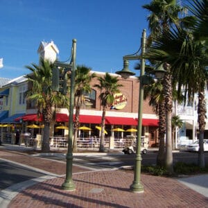 K206 Marina fixtures accompanied by Marina style arms on top of a Canterbury Jr. metal pole. This project is in front of a popular restaurant located in The Villages, Florida.