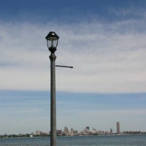 A K135 Fort Erie fixture accompanied by a banner arm on a Belmont pole.