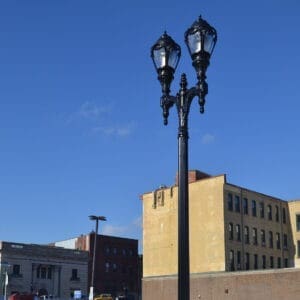 K136 Regency fixtures accompanied by Coshocton style arms on a Canterbury pole.