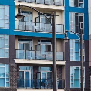 A K211 Manchester fixture accompanied by scroll arm on a Washington pole. Project is in Grimsby, Ontario.