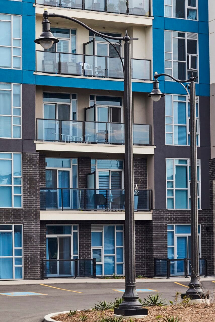 A K211 Manchester fixture accompanied by scroll arm on a Washington pole. Project is in Grimsby, Ontario.