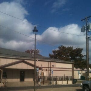 A K308 Moderne fixture atop a Round Tapered pole.