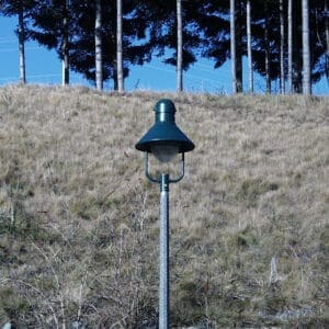 A K308 Moderne fixture atop a Hexagonal Tapered pole.