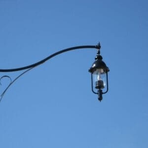 K330 Versailles fixture accompanied by a scroll style arm.