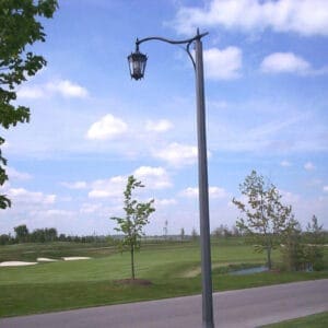 A K56 Tudor fixture accompanied by a Scroll style arm on a Belmont pole.
