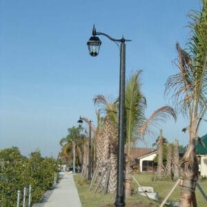 A K611 Balmoral fixture accompanied by a scroll style arm on top of a Washington pole.