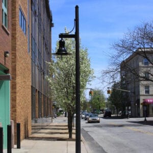 A K707 Doral Jr. fixture accompanied by a Marina style arm on a Round Tapered pole.