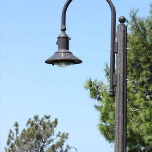 A K723 Falconridge Jr. fixture accompanied by a Bishop Crook style arm on top of a Talisman pole.