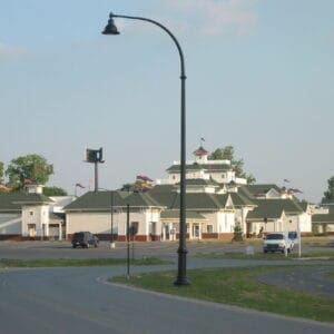 A K729 Aurora Jr. fixture accompanied by a low-rise style arm on top of a Canterbury pole. Project is on the outskirts if the Oklahoma Aquarium in Jenks, Oklahoma.