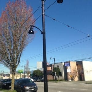 K809 Wilshire - Fluted Tapered K809 Wilshire fixtures accompanied by a low-rise style arm all on a Fluted Tapered pole.