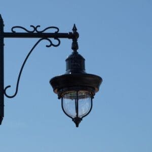 A K841 New City fixture accompanied by a custom-made arm all on a Canterbury pole.