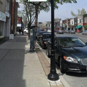 Banner arms and a KSB72 Vernon Jr. decorative split base on a round non-tapered aluminum pole. This project is in Mount Pleasant villages located in Brampton, Ontario.