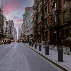 Multiple lit Garrison style bollards finished with one of our signature concrete décor colors - Eclipse Black. This project is located near the SoHo district in New York City.