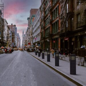 Multiple lit Garrison style bollards finished with one of our signature concrete décor colors - Eclipse Black. This project is located near the SoHo district in New York City.