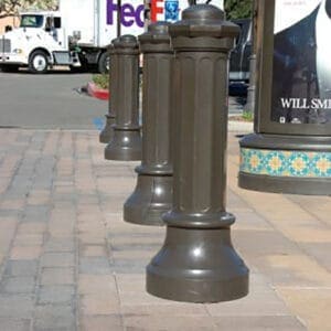 Multiple non-lit traditional style bollards finished off with one of our signature powder coat colors – Gate Gray. This project is located outside of The oaks shopping center in Thousand Oaks, California.