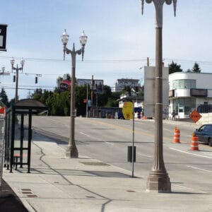 K445 Sol-Lux fixtures accompanied by Coshocton style arms all on a Memphis pole.