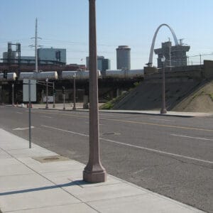 A K137 Yarmouth fixture atop a St. Louis pole. This project is on one of the busy streets of St. Louis, Missouri with The Gateway Arch in the background.
