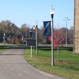 A K118 Washington fixture accompanied by banner arms all on a Traditional pole. This project is at the Tuscaloosa Riverwalk located in Tuscaloosa, Alabama.