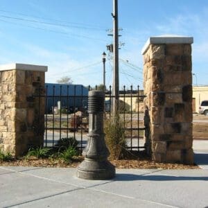 Washington Bollard - Concrete A lit Washington style bollard finished with one of our signature concrete décor colors - Midnight Lace.