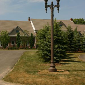 K124 Paragon fixtures accompanied by Coshocton style arms on top of a Washington pole.