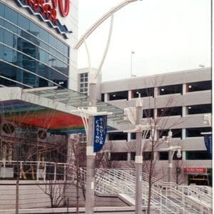 A light fixture accompanied by a Windsor style arm and banner arms on top of a Windsor pole. This project is just outside of Windsor Casino located in Windsor, Ontario.
