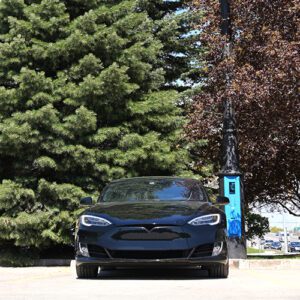 A K803 fixture accompanied by a Pipe style arm on a VoltLock EV Charger Pole.