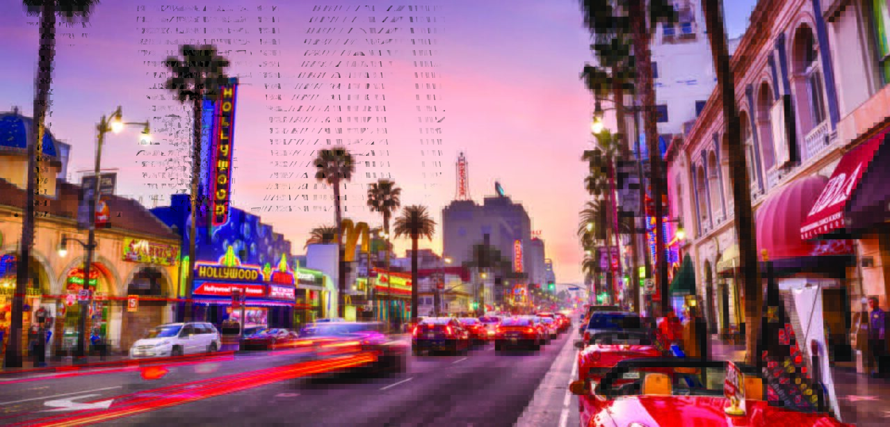 Multiple K803 Solitaire Sr. and K703 Solitaire Jr. fixtures installed on the busy street of Hollywood Blvd, located in Los Angeles, California.