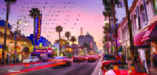 Multiple K803 Solitaire Sr. and K703 Solitaire Jr. fixtures installed on the busy street of Hollywood Blvd, located in Los Angeles, California.