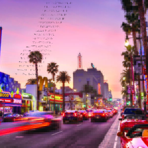 Multiple K803 Solitaire Sr. and K703 Solitaire Jr. fixtures installed on the busy street of Hollywood Blvd, located in Los Angeles, California.