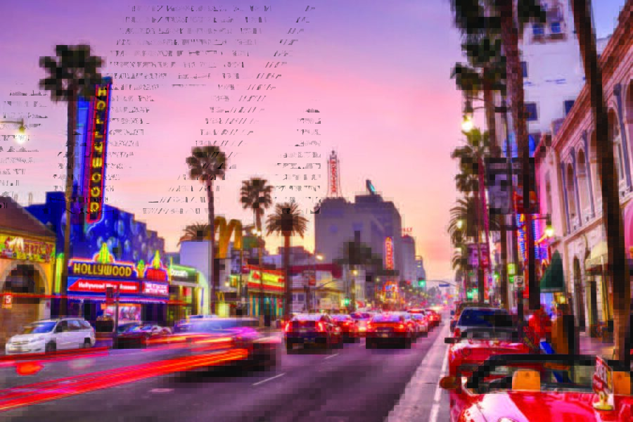 Multiple K803 Solitaire Sr. and K703 Solitaire Jr. fixtures installed on the busy street of Hollywood Blvd, located in Los Angeles, California.