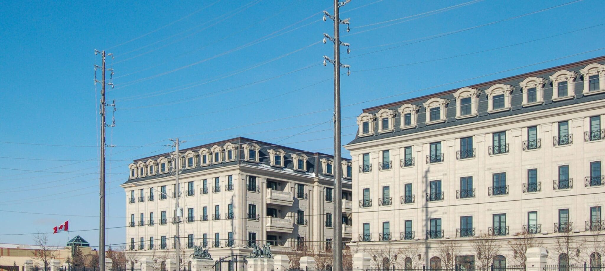 Colored spun concrete poles in a "road crossing" application. This project is located on the side of Highway 7 Boulevard in Markham, Ontario (York Region).