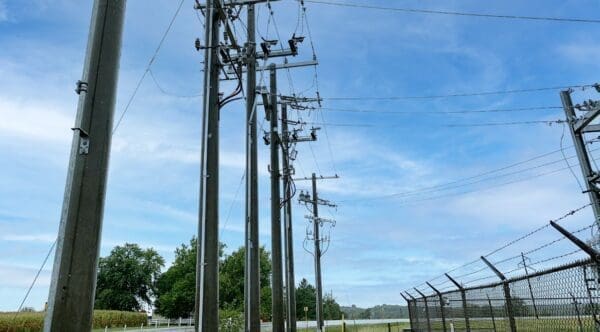 Multiple spun concrete utility poles installed in the city of Keosauqua, Iowa.