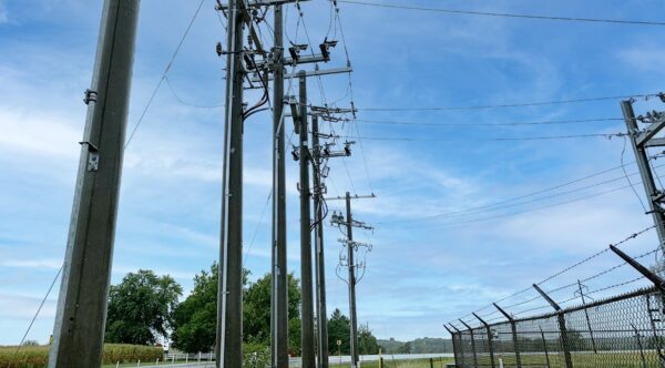 Multiple spun concrete utility poles installed in the city of Keosauqua, Iowa.