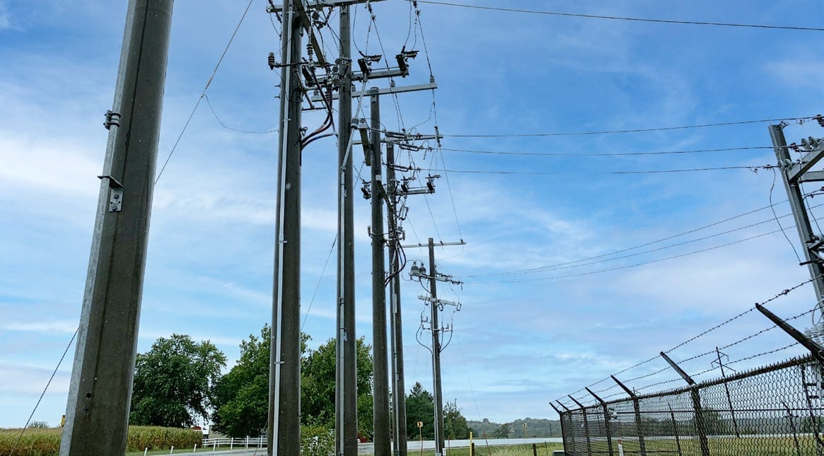 Multiple spun concrete utility poles installed in the city of Keosauqua, Iowa.