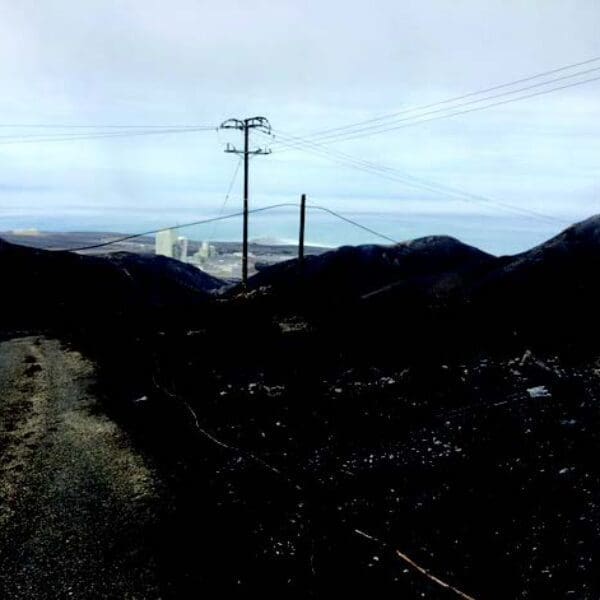 Aftermath of the historical fire at the Vandenberg Air Force Base. The only object left standing amidst the rubble is one of StressCrete's spun concrete poles.