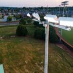 KSL1 STRATOS fixtures accompanied by a cross arm atop of a sports lighting pole. This project is at Shelton State Community College's softball diamonds in Tuscaloosa, Alabama.
