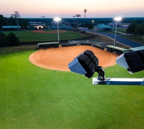 KSL1 STRATOS fixtures accompanied by a cross arm atop of a sports lighting pole. This project is at Shelton State Community College's softball diamonds in Tuscaloosa, Alabama.